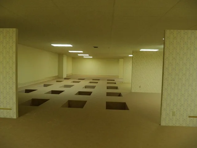 a strange room with holes in the floor